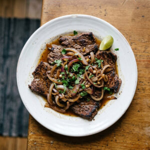 Bistec Encebollado